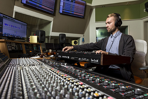 Music Engineering student works in a lab